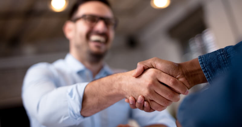 Two people shaking hands